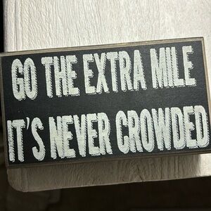 Go the Extra mile sign